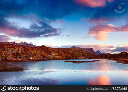 Beautiful landscape of Kabelvag, amazing view of a mountains in sunset light which reflecting in the lake, gorgeous nature of fisherman&rsquo;s town, Norway