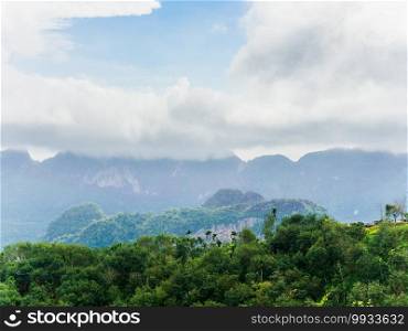 beautiful landscape of mountain with cloudy sky and greenery in rainy season at Doi Tapang, Sawi District, Chumphon, Thailand.