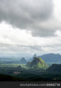 beautiful landscape of mountain with cloudy sky and greenery in rainy season at Doi Tapang, Sawi District, Chumphon, Thailand.