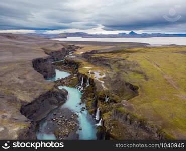 Beautiful landscape of Sigoldugljufur canyon with many small waterfalls and the blue river in Highlands of Iceland