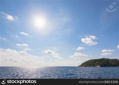 Beautiful landscape of sun on blue sky over the sea in summer at Mu Koh Similan National Park, Phang Nga Province, Thailand