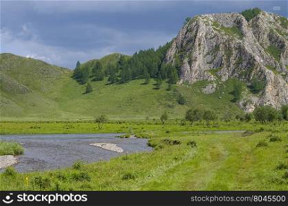 beautiful landscape of the mountain and river in the summer