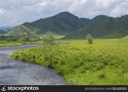 beautiful landscape of the mountain and river in the summer