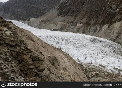 Beautiful landscape scenery of white Passu Glacier in Karakoram mountain range, Gojal Hunza. Gilgit Baltistan, Pakistan.