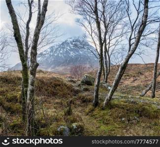 Beautiful landscape Winter portrait ofn Stob Dearg Buachaille Etive Mor mountain and snowcapped peak in Scottish Highlands