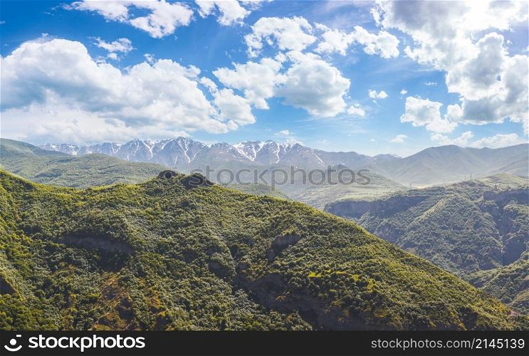 Beautiful landscape with green mountains and magnificent cloudy sky. landscape with mountains and sky
