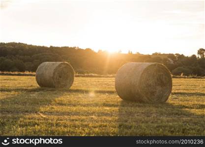 beautiful landscape with rolls hays sunset