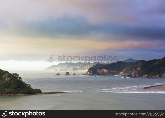 Beautiful landscapes it the Ocean Beach, New Zealand. Inspiring natural and travel background