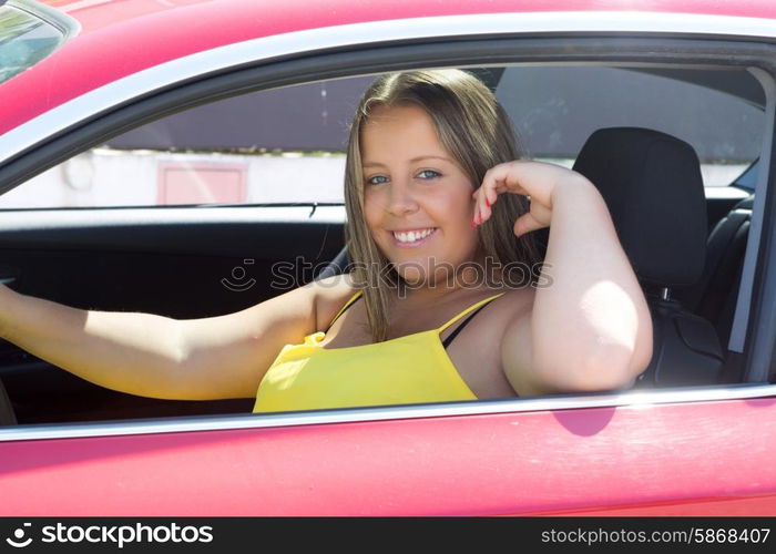 Beautiful large woman driving a red sports car