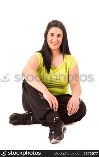 Beautiful large woman exercising - isolated over a white background