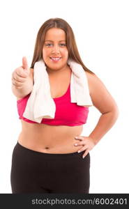 Beautiful large woman exercising - isolated over a white background