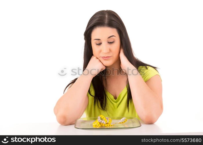 Beautiful large woman, trying to resist to an appetizing hamburger, which would kill her diet