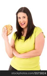 Beautiful large woman, trying to resist to an appetizing hamburger, which would kill her diet