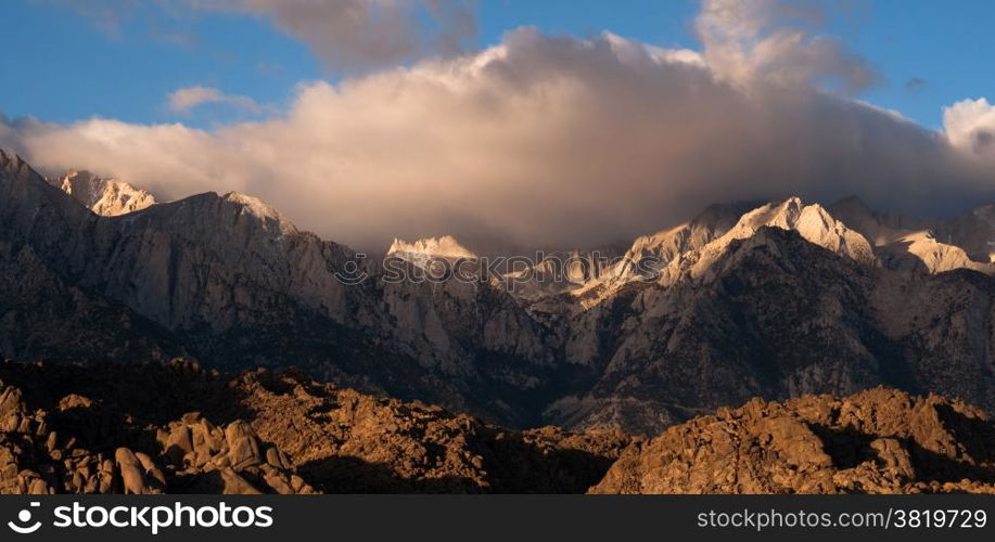 Beautiful light hits the mountain range above Alabama Hills