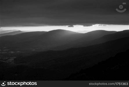Beautiful light spilling over the ridges of Shenandoah National Park, taken in black and white.