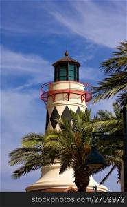 beautiful lighthouse over blue sky and palm trees. Destin, Florida, USA