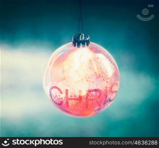 Beautiful lighting Christmas ball with bokeh on turquoise blue background