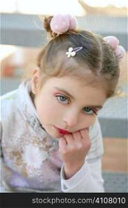Beautiful little caucasian toddler girl with asian costume and makeup
