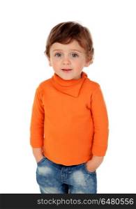 Beautiful little child two years old wearing jeans and orange je. Beautiful little child two years old wearing jeans and orange jersey isolated on white background