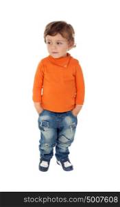 Beautiful little child two years old wearing jeans and orange jersey isolated on white background