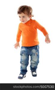 Beautiful little child two years old wearing jeans and orange jersey runing isolated on white background