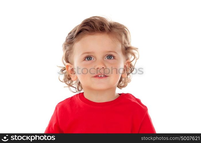 Beautiful little child two years old with red jersey smiling isolated on a white background