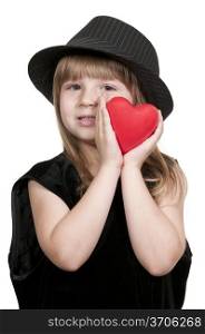 Beautiful little girl holding a Valentines Day heart