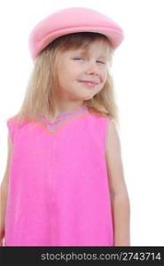 Beautiful little girl in a pink cap. Isolated on white background