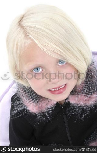 Beautiful Little Girl In Black Jacket With Feather Trim. Big bright blue eyes.