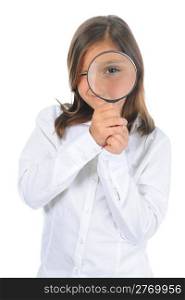 Beautiful little girl looking through a magnifying glass isolated on a white background