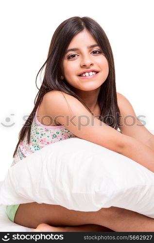 Beautiful little girl relaxing on her bed