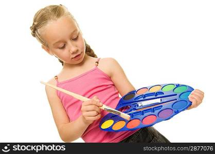 Beautiful little girl with a paintbrush, Isolated on white