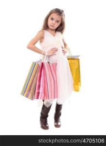 Beautiful little girl with shopping bags