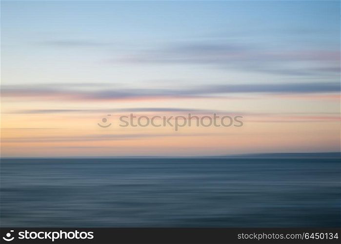 Beautiful long exposure sunset landscape image of Portland in Dorset England