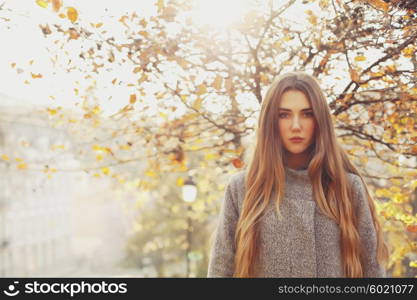 beautiful long hair model in the street on a sunny day.