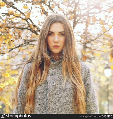 beautiful long hair model in the street on a sunny day.