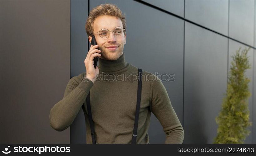 beautiful male model talking phone