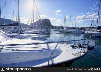 Beautiful marina view, sailboats and motorboats in blue water