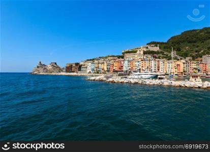 Beautiful medieval fisherman town of Portovenere bay (near Cinque Terre, Liguria, Italy). Harbor wit boats and yachts. People are unrecognizable.