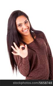 Beautiful mix race woman showing Ok sign over white background