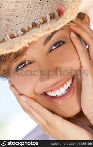 Beautiful Mixed Race Woman Laughing In Straw Coboy Hat