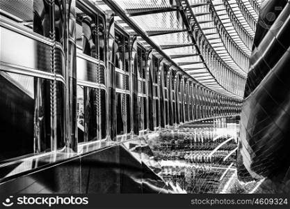 Beautiful modern interior of office building, abstract black and white background, stylish contemporary steel contraction
