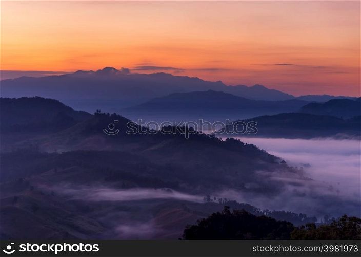 Beautiful morning fog in the valley of northern Thailand, Mae Hong Son, Ban Ja Bo.. Beautiful fog with warm light over mountain.