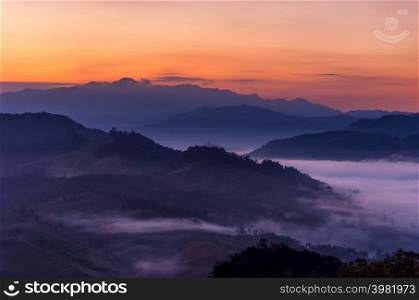 Beautiful morning fog in the valley of northern Thailand, Mae Hong Son, Ban Ja Bo.. Beautiful fog with warm light over mountain.