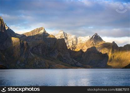 Beautiful mountain and lake landscape in a morning with blue sky and cloudy, Lofoten, Norway