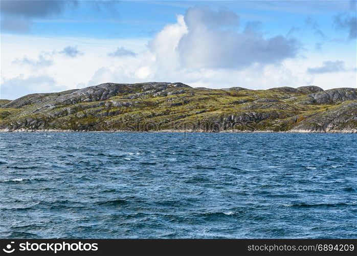 Beautiful mountain and sea landscape with blue sky, Norway, selective focus