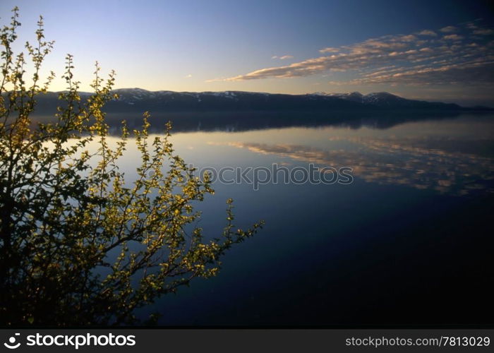 Beautiful mountain lake with blue sky and clean water