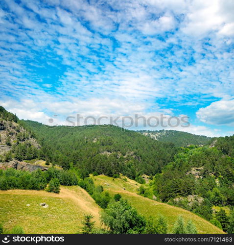 Beautiful mountain landscape and sky. The concept is travel.