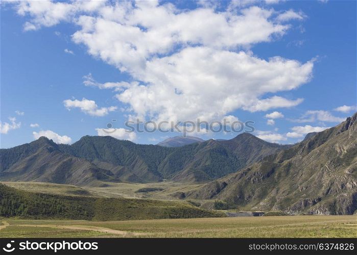 Beautiful mountain landscape with clouds in the sky. Beautiful mountain landscape with clouds in the sky.