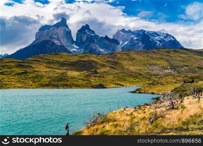 Beautiful mountain landscape with the Cuernos del Paine mountains and mountain Lake Pehoe in Torres del Paine National Park in Chile